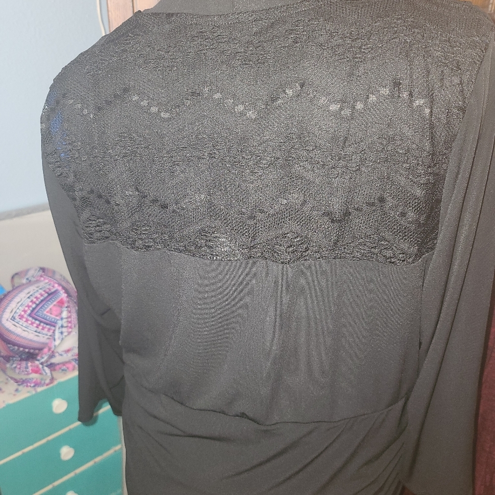 Black lace back blouse. Torrid 4